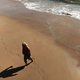 Not the man or the beach, but you know. Image via Getty.